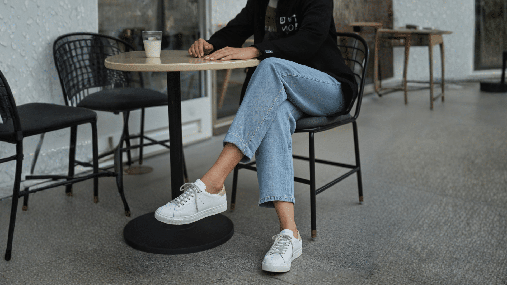 Casual coffee date shoes including white sneakers, neutral sandals, and ballet flats